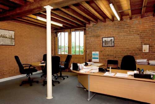 A great suite of 3 good-sized offices including kitchen and side door to outside